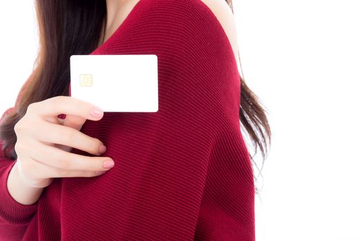 Woman holding blank business credit card for mock up, girl with debit card on hand, commercial with shopping payment concept.