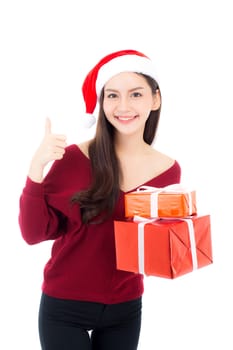 Happy asian woman with smile holding gift box many of xmas, Present girl sign ok with celebration christmas a holiday, girl with buyer isolated on white background.