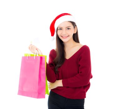 Happy fashion asian woman with smile holding shopping paper bag and credit card, Sale and christmas with holiday, girl with buyer enjoy and excited isolated on white background, season concept.