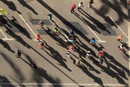 Santa Pola, Spain- January 21, 2018: Runners in the Half Marathon of the fishing village of Santa Pola, province of Alicante, on a sunny day in January