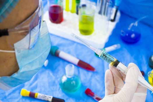 Doctors and needle, vaccination, antibiotic and immunization. Woman in uniform and needle with hand.