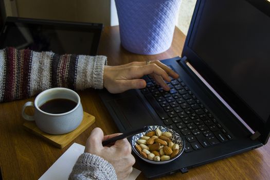 Working process, workspace and workspace, hand, coffee and notebook