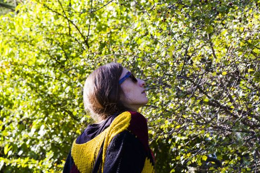 Woman in the botanic garden and park, trees and casual young girl portrait in garden