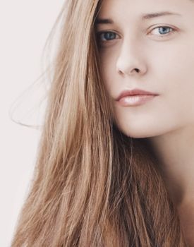 Beauty face portrait of a young woman, natural makeup look, skincare and hair care brand