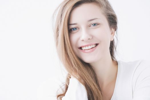 Beauty face portrait of a young woman, natural makeup look, skincare and hair care brand