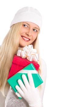 Happy woman holding Christmas gifts, white background with copyspace, shopping and holidays