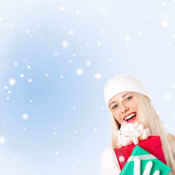 Happy woman holding Christmas gifts, blue background and snow glitter with copyspace, shopping and holidays