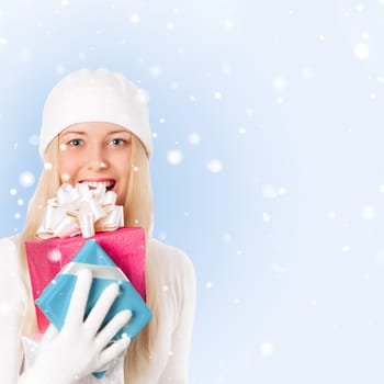 Happy woman holding Christmas gifts, blue background and snow glitter with copyspace, shopping and holidays