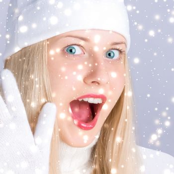 Magical Christmas and glitter snow background, blonde woman with positive emotion in winter season for shopping sale and holiday brands