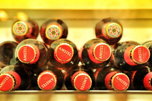 Alicante, Spain- January 16, 2019: Fridge with variety of international beers in a bar
