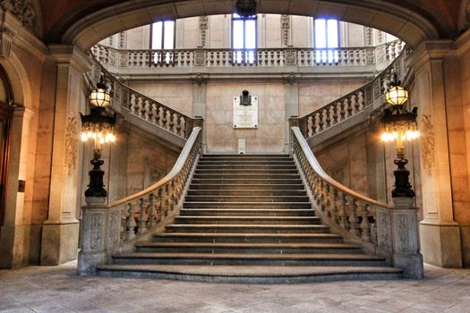 Porto, Portugal- January 6, 2020: Beautiful and sumptuous stairway built in 1868 by Goncalves e Sousa of the Stock Exchange Palace in Porto