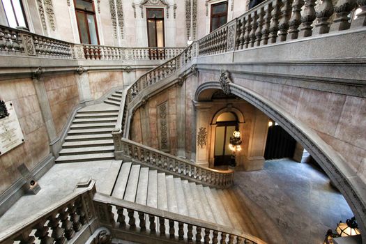 Porto, Portugal- January 6, 2020: Beautiful and sumptuous stairway built in 1868 by Goncalves e Sousa of the Stock Exchange Palace in Porto