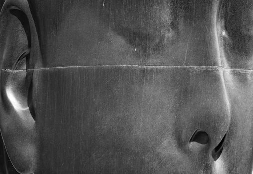 Elche, Alicante, Spain- July 20, 2020: Beautiful three-dimensional sculpture of a woman's face of the artist Jaume Plensa exhibited in the main square of Elche