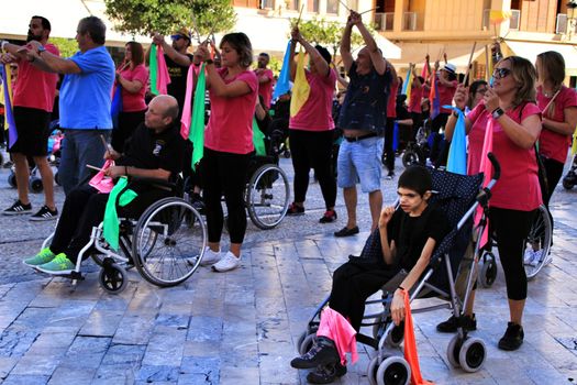Elche, Alicante, Spain- October 3, 2018: People participating and having fun with activities in Elche city celebrating the world day of cerebral palsy