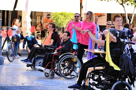 Elche, Alicante, Spain- October 3, 2018: People participating and having fun with activities in Elche city celebrating the world day of cerebral palsy