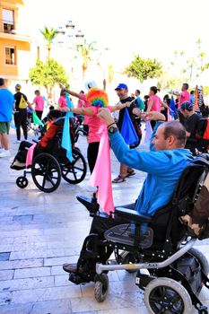 Elche, Alicante, Spain- October 3, 2018: People participating and having fun with activities in Elche city celebrating the world day of cerebral palsy