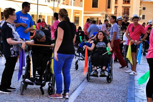 Elche, Alicante, Spain- October 3, 2018: People participating and having fun with activities in Elche city celebrating the world day of cerebral palsy
