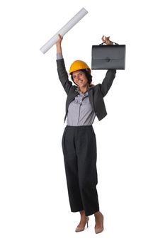 Portrait of female engeneer architect in yellow hardhat and business suit with raised arms isolated on white background full length studio portrait