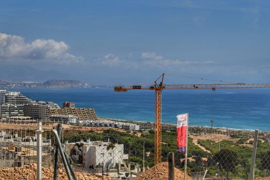 Alicante, Spain- July 28, 2020: Houses under construction in the urbanization of Gran Alacant in southern Spain