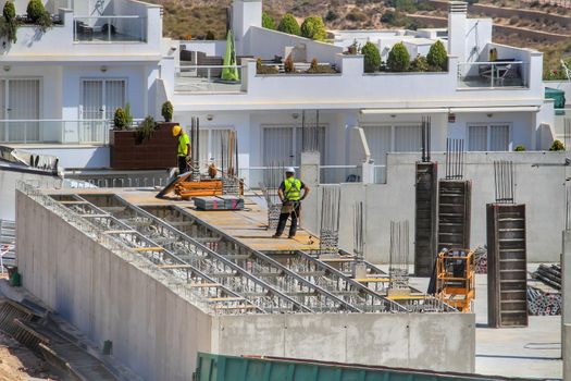 Alicante, Spain- July 28, 2020: Houses under construction in the urbanization of Gran Alacant in southern Spain