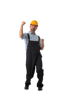 Mature contractor worker in coveralls and hardhat holding fists isolated on white background full length studio portrait