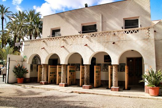 Elche, Alicante, Spain- February 14, 2019: Old house with hermitage in the Huerto del Cura Garden in winter