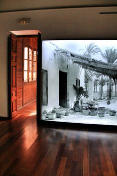 Elche, Alicante, Spain- August 30, 2020: Photograph of an old country house inside the museum of the Palm Tree in Elche, Alicante