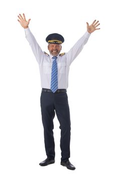 Airline pilot wearing the four bar Captains epaulettes, firlst pilot, aircraft commander with raised arms isolated on white background full length studio portrait