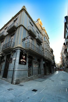 Elche, Alicante, Spain- September 9, 2020: Streets, majestic facades, windows and balconies of Elche city. Alicante province, Spain.