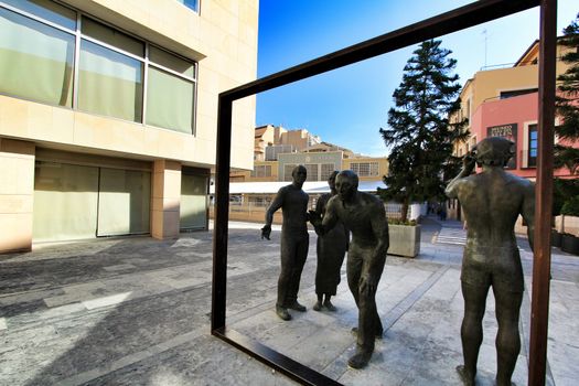 Elche, Alicante, Spain- October 7, 2020: Sculpture by Joan Ramon Garcia Castejon called 'La Critica' in front of the town hall of Elche
