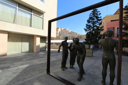 Elche, Alicante, Spain- October 7, 2020: Sculpture by Joan Ramon Garcia Castejon called 'La Critica' in front of the town hall of Elche