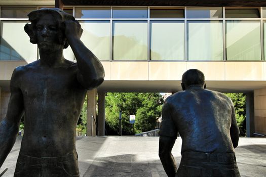 Elche, Alicante, Spain- October 7, 2020: Sculpture by Joan Ramon Garcia Castejon called 'La Critica' in front of the town hall of Elche