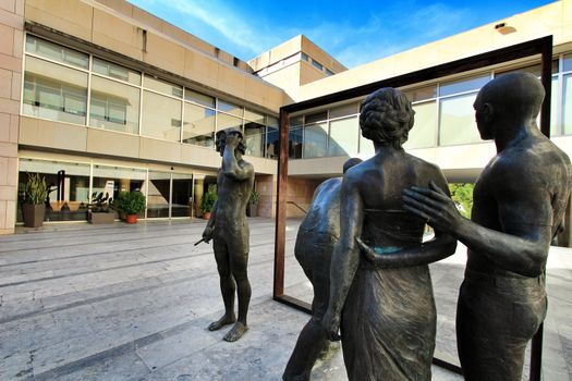 Elche, Alicante, Spain- October 7, 2020: Sculpture by Joan Ramon Garcia Castejon called 'La Critica' in front of the town hall of Elche