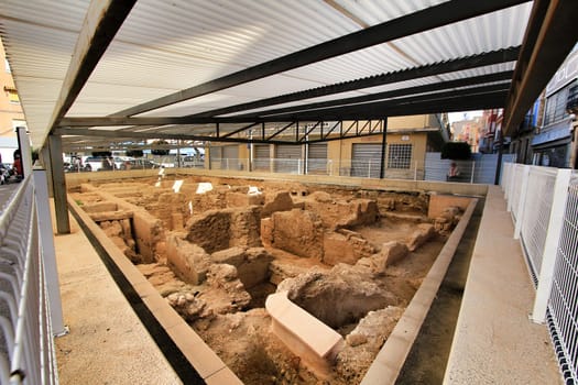 Elche, Alicante, Spain- October 7, 2020: Archeological remains found in the Fruita Square next to the old Municipal Market of Elche.