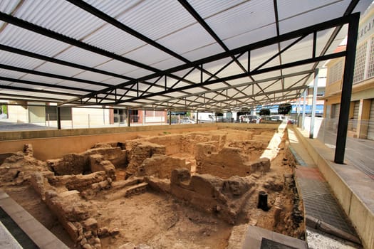 Elche, Alicante, Spain- October 7, 2020: Archeological remains found in the Fruita Square next to the old Municipal Market of Elche.