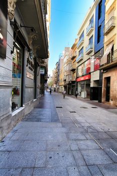Elche, Alicante, Spain- October 7, 2020: Pedestrian street called Corredora plenty of shops in the center of the city of Elche in the morning