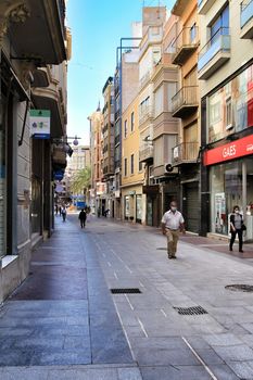 Elche, Alicante, Spain- October 7, 2020: Pedestrian street called Corredora plenty of shops in the center of the city of Elche in the morning