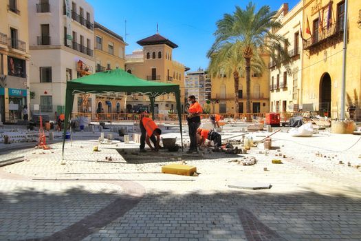 Elche, Alicante, Spain- October 7, 2020: Pedestrianization works at the Town Hall square in Elche, Alicante in Autumn