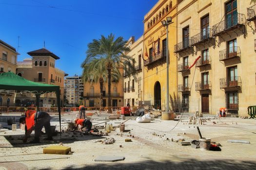 Elche, Alicante, Spain- October 7, 2020: Pedestrianization works at the Town Hall square in Elche, Alicante in Autumn