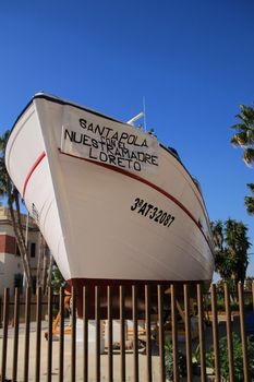 Santa Pola, Alicante, Spain- December 6, 2018: Banner supporting rescued immigrants by local fishermen in Santa Pola, Spain.