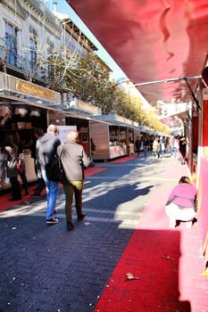 Jijona, Alicante, Spain- December 9, 2018: People walking and buying traditional nougat at the Jijona Christmas Fair