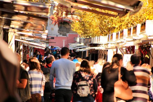 Jijona, Alicante, Spain- December 9, 2018: People walking and buying traditional nougat at the Jijona Christmas Fair