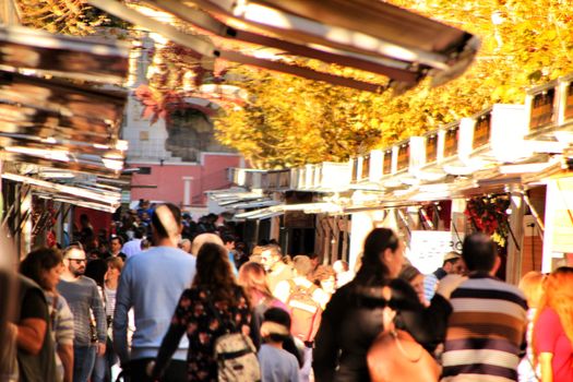Jijona, Alicante, Spain- December 9, 2018: People walking and buying traditional nougat at the Jijona Christmas Fair