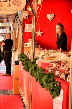 Jijona, Alicante, Spain- December 9, 2018: People walking and buying traditional nougat at the Jijona Christmas Fair