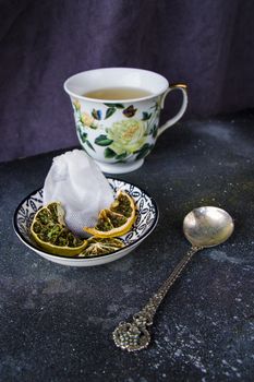 Set of tea, vintage silverware spoons, various of tea and cup of tea