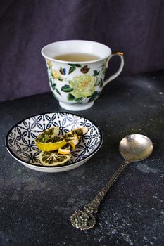 Set of tea, vintage silverware spoons, various of tea and cup of tea