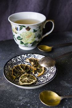 Set of tea, vintage silverware spoons, various of tea and cup of tea