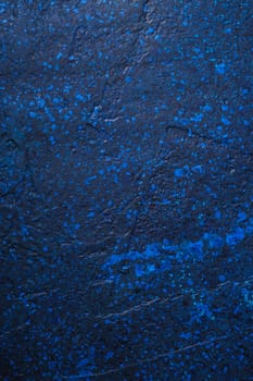 Dark blue color abstract background, stained art paint texture