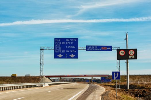 Belarus, Minsk - 24.03.2017: road junction with road signs on the motorway