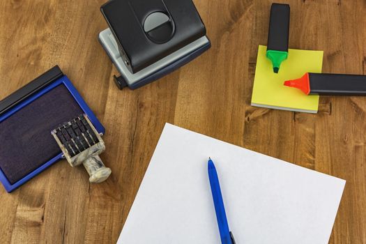 Different office supplies are on the table